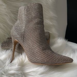 Multi colored Sangria boots. Worn once and comes with box.